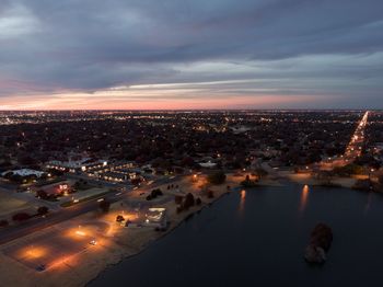 Brilliant birds-eye view of pond overlooking lubbock, tx. 