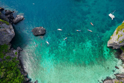 High angle view of rocks in sea