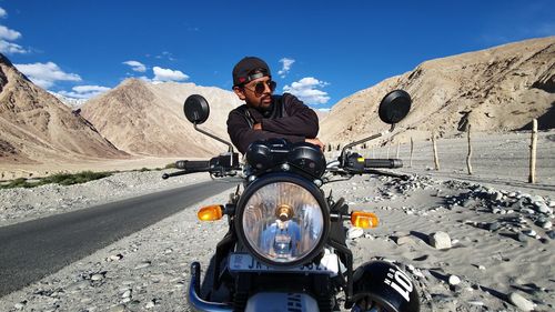 Ruding motorcycle on a open road