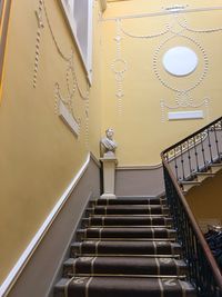 Low angle view of spiral staircase in building