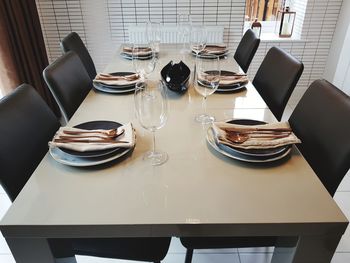 High angle view of place setting on table in restaurant