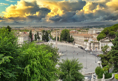 High angle view of townscape against cloudy sky