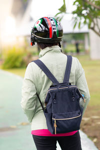 Rear view of man with umbrella