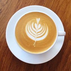 High angle view of cappuccino on table