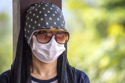 Portrait of woman wearing sunglasses