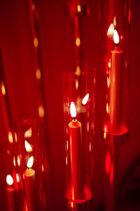 Close-up of illuminated tea light candles