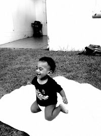 Boy sitting on floor