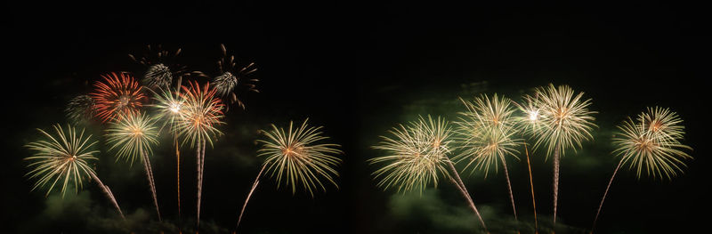 Low angle view of firework display at night