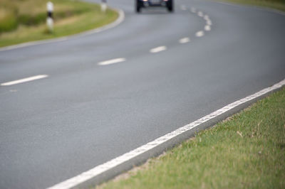 Close-up of road by street