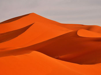Low angle view of  sand desert against sky