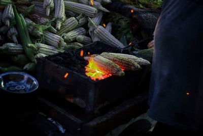 High angle view of corns being grilled on barbecue grill