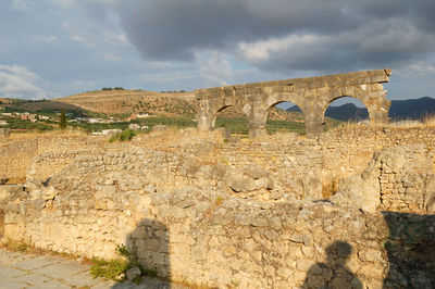 Arch bridge over mountain