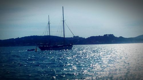 Boats sailing in sea