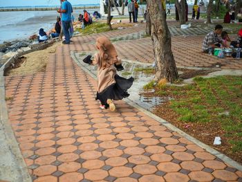 People walking on footpath