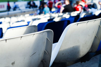 Close-up of empty chairs against the wall