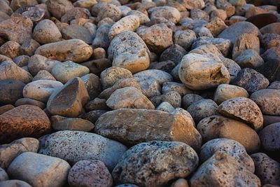 Full frame shot of stones at sunset