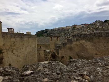 View of castle against cloudy sky