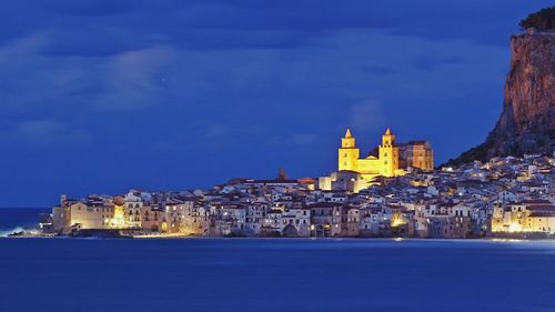 Scenic view of coastline at dusk