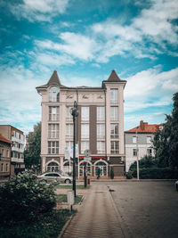 Facade of building against sky