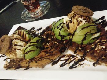 Close-up of dessert served on table