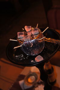 Close-up of burning coals on hookah