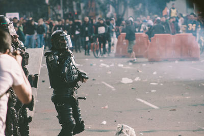 Rear view of people in town square
