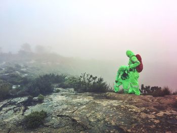 Mountain guides on top of the drakensberg mountains on a very cold and wet day