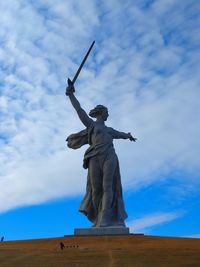 Low angle view of statue against sky