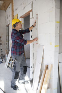 Full length of man working in workshop