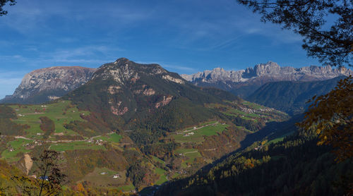 Autumn panorama of the dolomitic mountains in the tires valley, south tyrol, italy