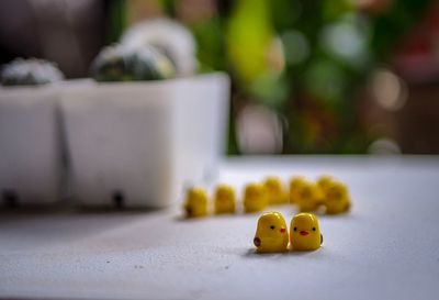 Close-up of yellow toy on table