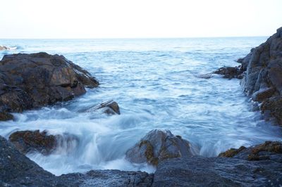 Scenic view of sea against clear sky