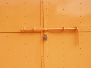 Full frame shot of yellow closed doors