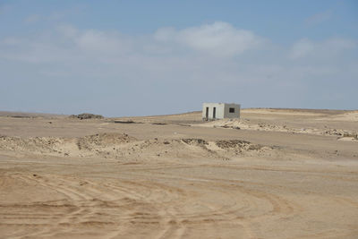 Scenic view of desert against sky