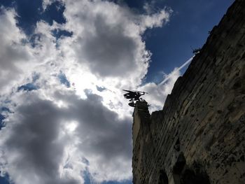 Low angle view of old building against sky