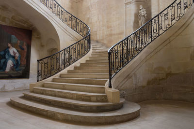 Low angle view of spiral staircase in building