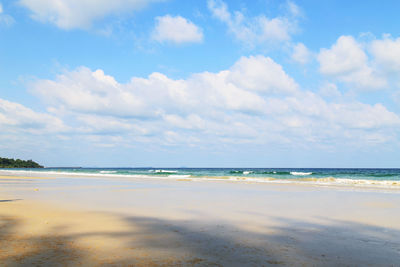 Scenic view of beach against sky