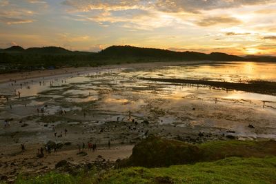 Scenic view of sea at sunset