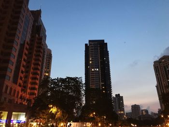 Low angle view of skyscrapers against sky