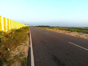 Road against clear sky