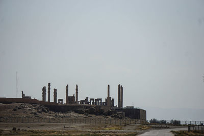 Panoramic view of factory against clear sky