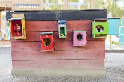 Multi colored animal houses stuck on wall