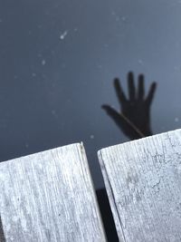 Close-up of hand on table