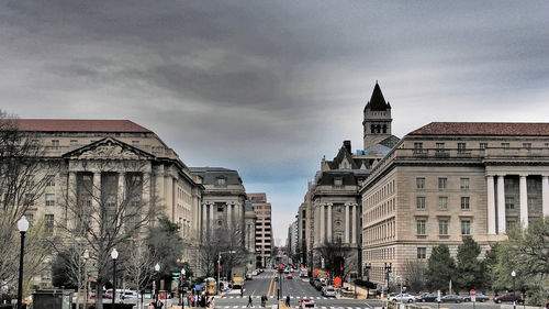 View of buildings against cloudy sky