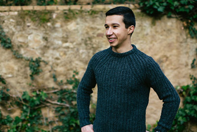 Portrait of young man outdoors