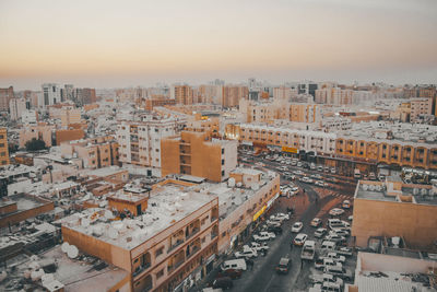 High angle view of buildings in city against sky