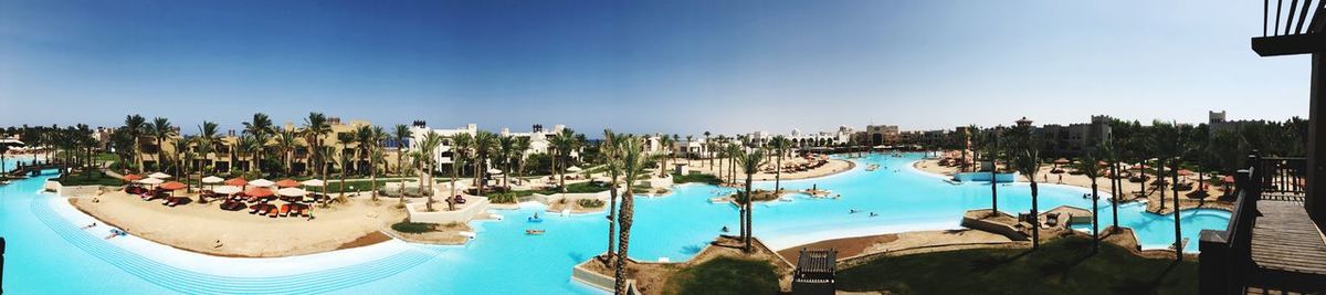 Panoramic view of swimming pool against sky