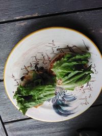 High angle view of vegetables in plate on table