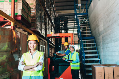 Portrait of people working in warehouse