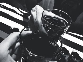 Close-up of hand holding drink